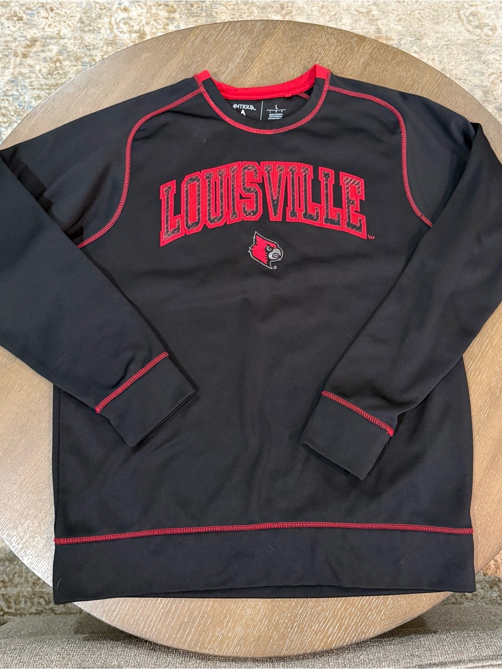 Antigua Black Crewneck Sweatshirt with Red Louisville Embroidery